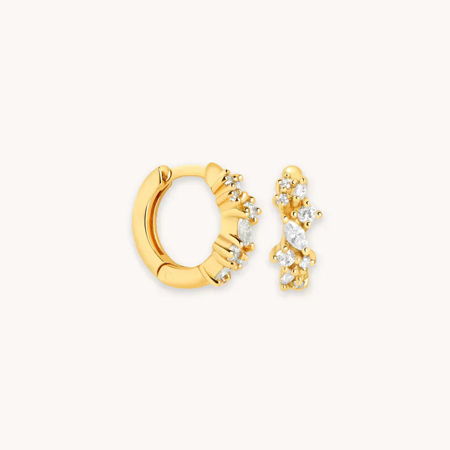 "クリスタルクラスター ハギー | 18k ゴールド" can be rewritten as "クリスタルクラスター ハギー | 18k ゴールド" (removing the specific names as requested). 

If you would like a different variation or style, please let me know!